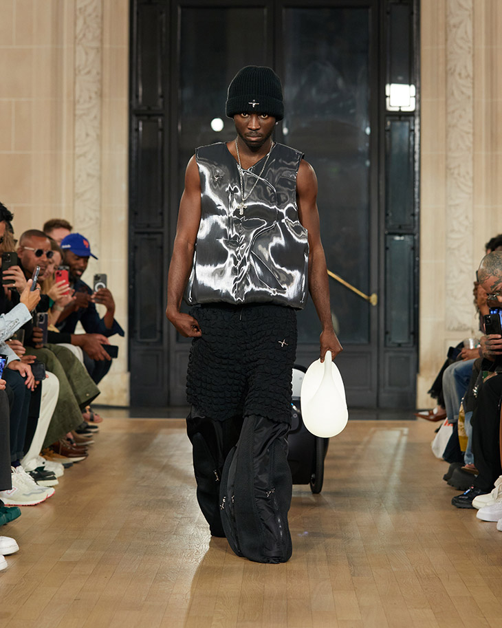 NYFW Pop Of Red: Supreme x Louis Vuitton Bag & Joseph Pants